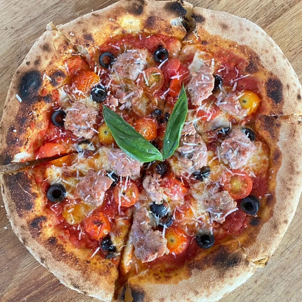 Pizza Glur & Bistro at Glur Hostel_Napolitana Mixed with italian sausage black olive and cherry tomato.