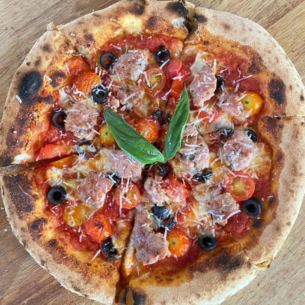 Pizza Glur & Bistro at Glur Hostel_Napolitana Mixed with italian sausage black olive and cherry tomato.